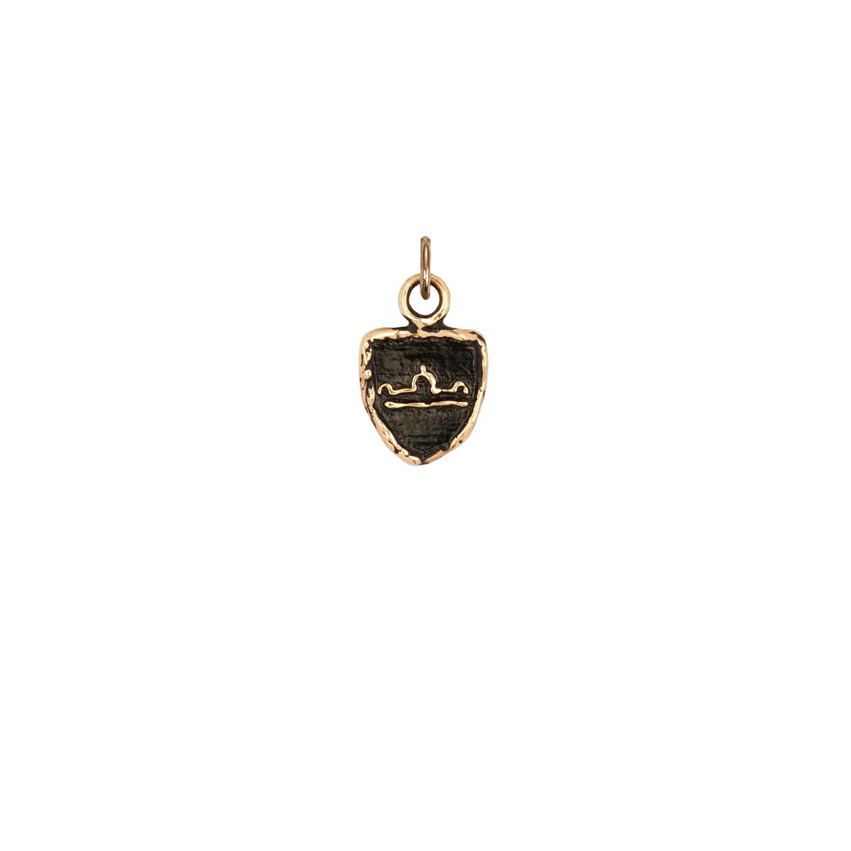 A 14k gold Libra zodiac charm.