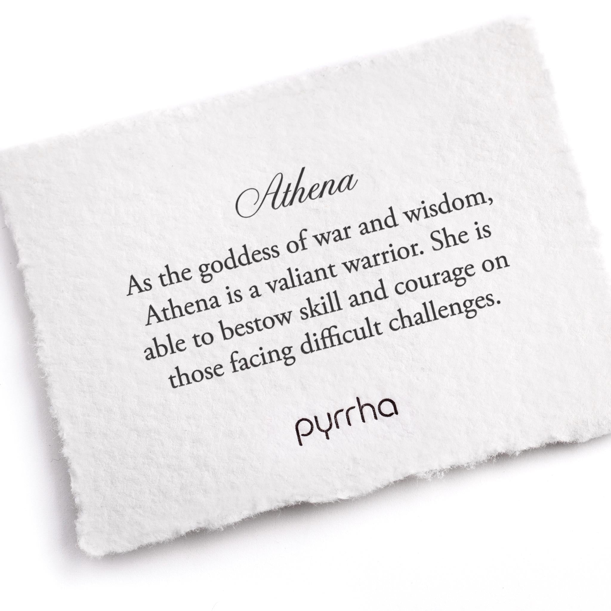 A hand-torn, letterpress printed card describing the meaning for Pyrrha's Athena Goddess Talisman