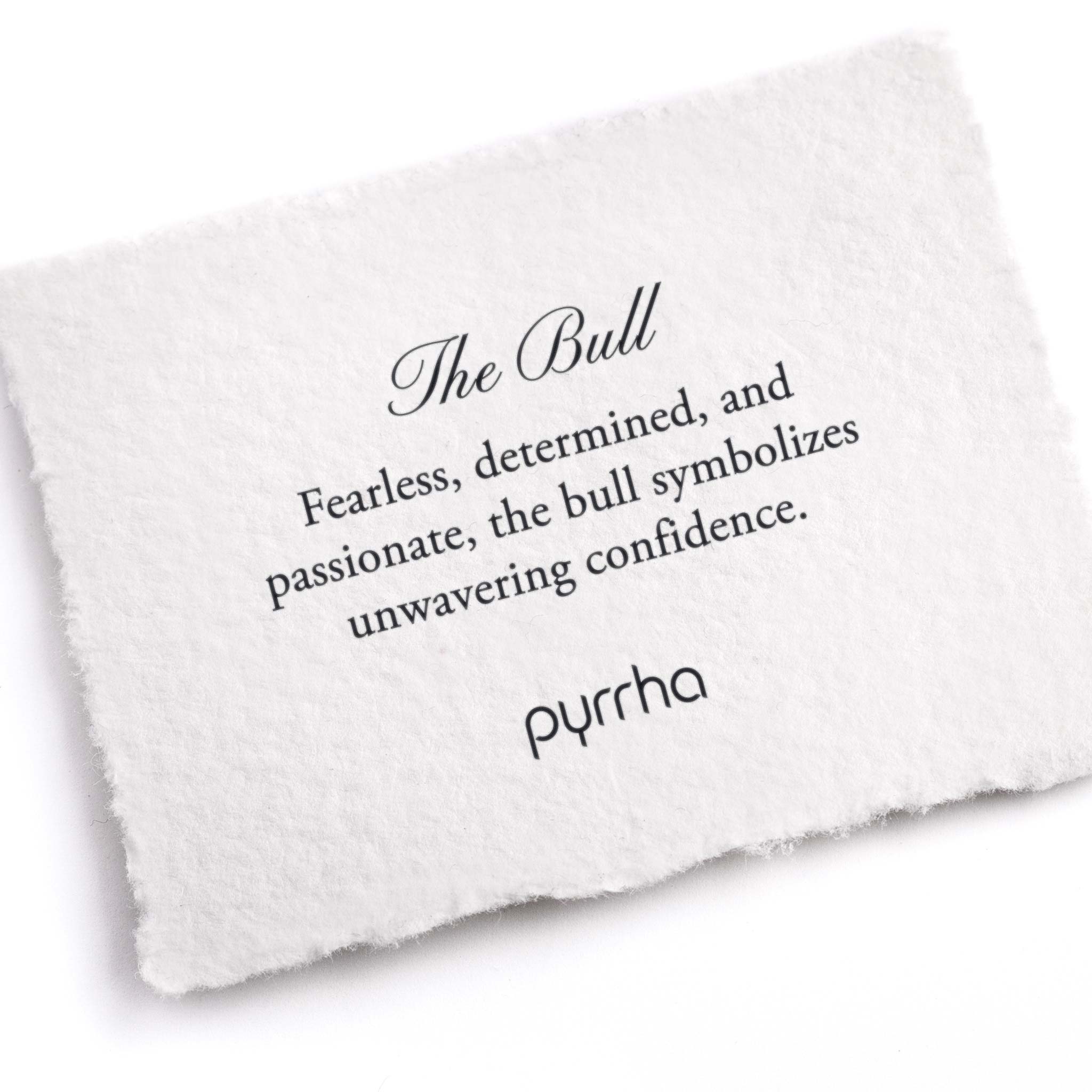 A hand-torn, letterpress printed card describing the meaning for Pyrrha's Bull Pin