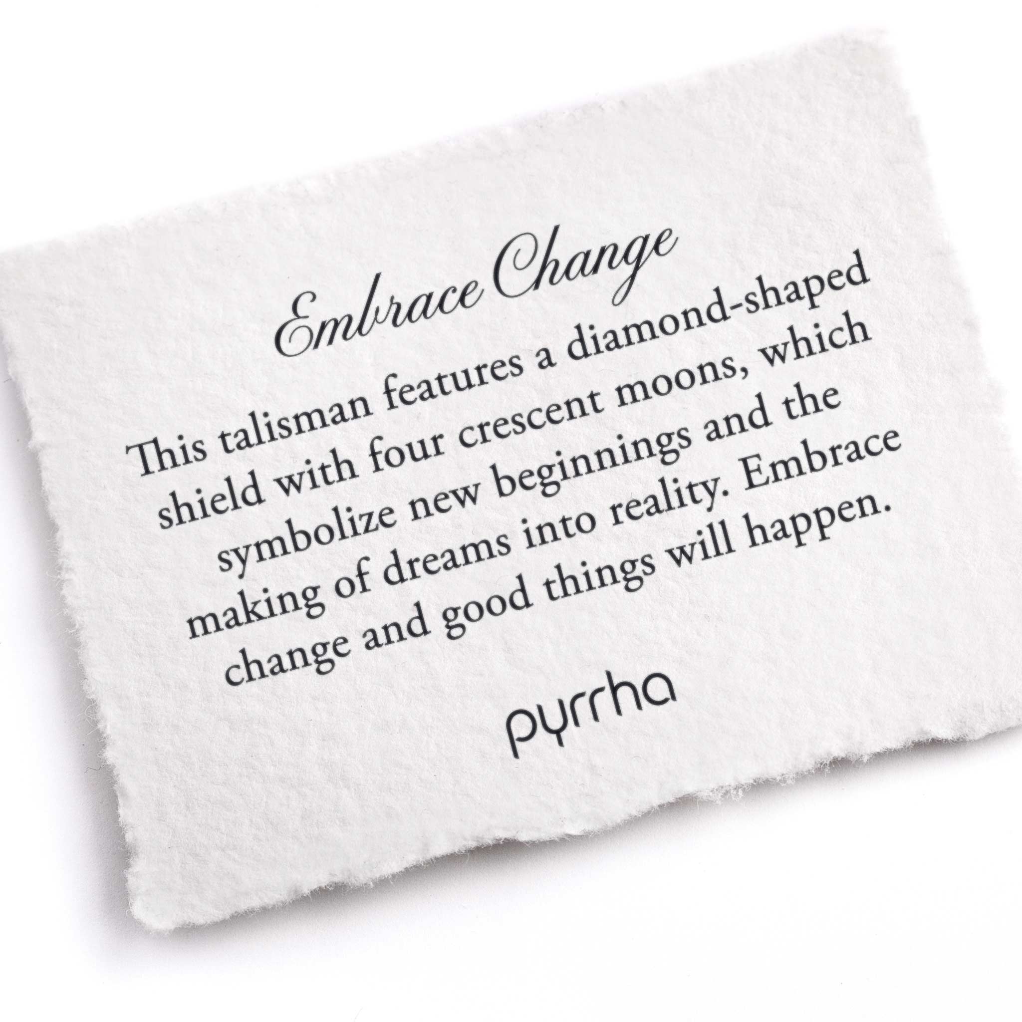 A hand-torn, letterpress printed card describing the meaning for Pyrrha's Embrace Change Talisman