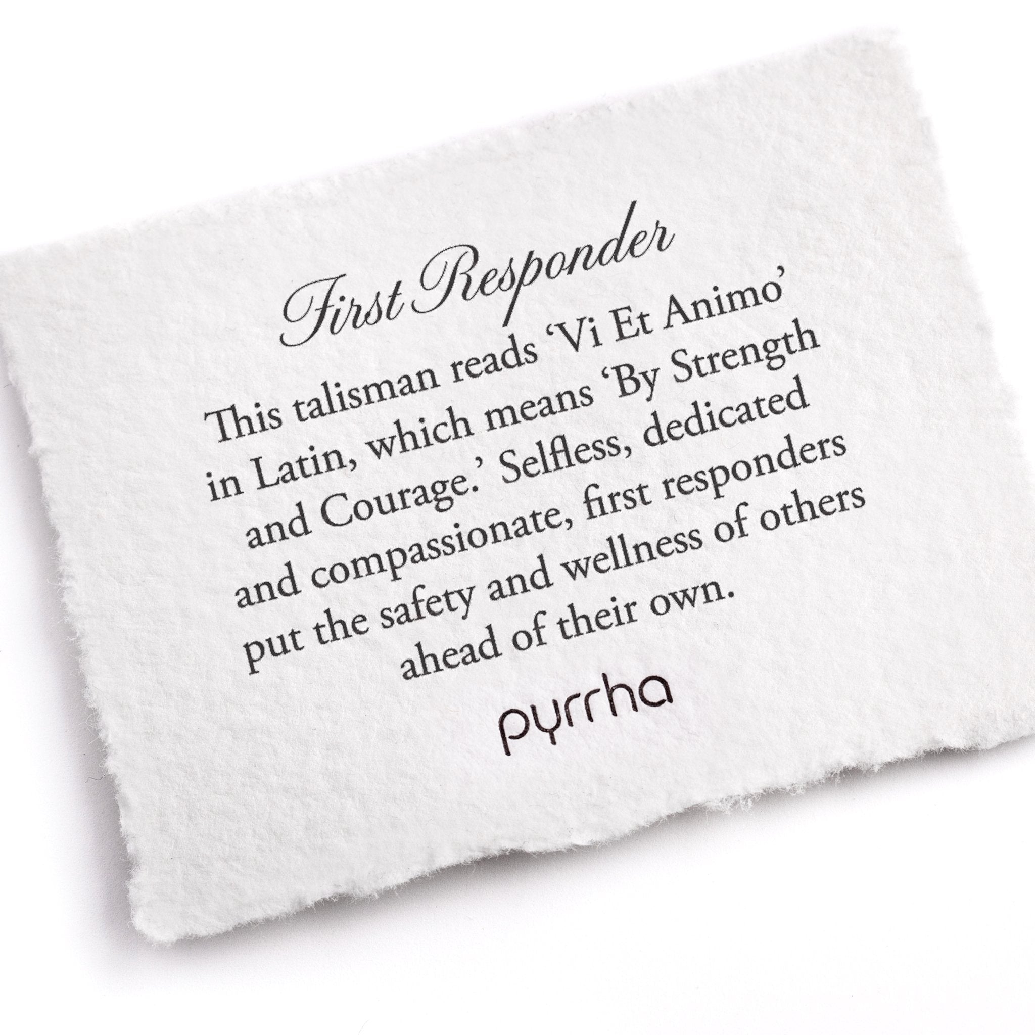 A hand-torn, letterpress printed card describing the meaning for Pyrrha's First Responder Talisman
