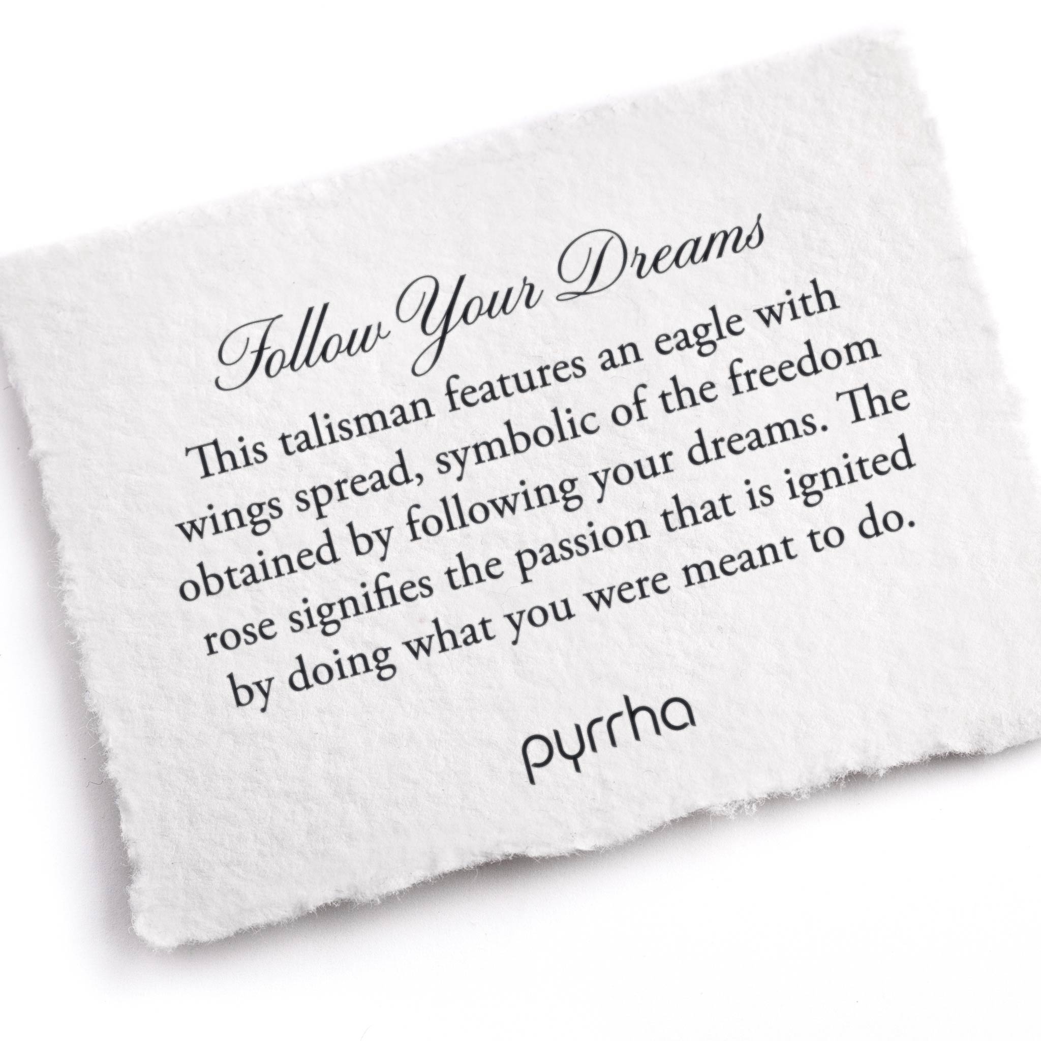A hand-torn, letterpress printed card describing the meaning for Pyrrha's Follow Your Dreams Talisman