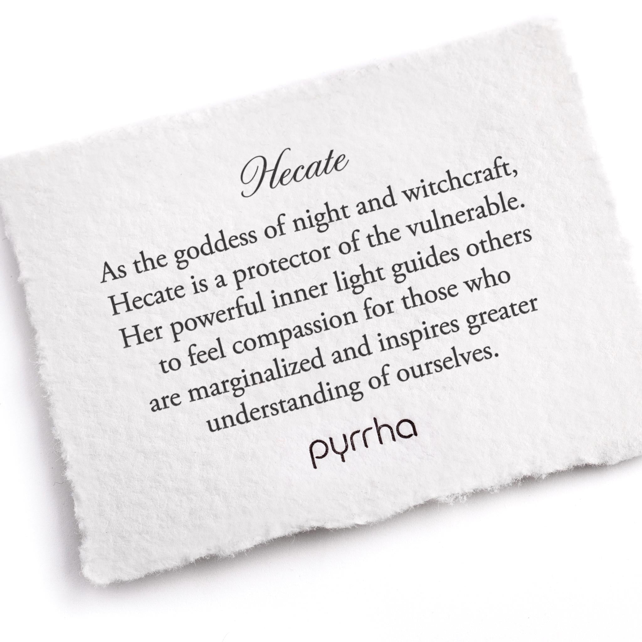 A hand-torn, letterpress printed card describing the meaning for Pyrrha's Hecate Goddess Talisman
