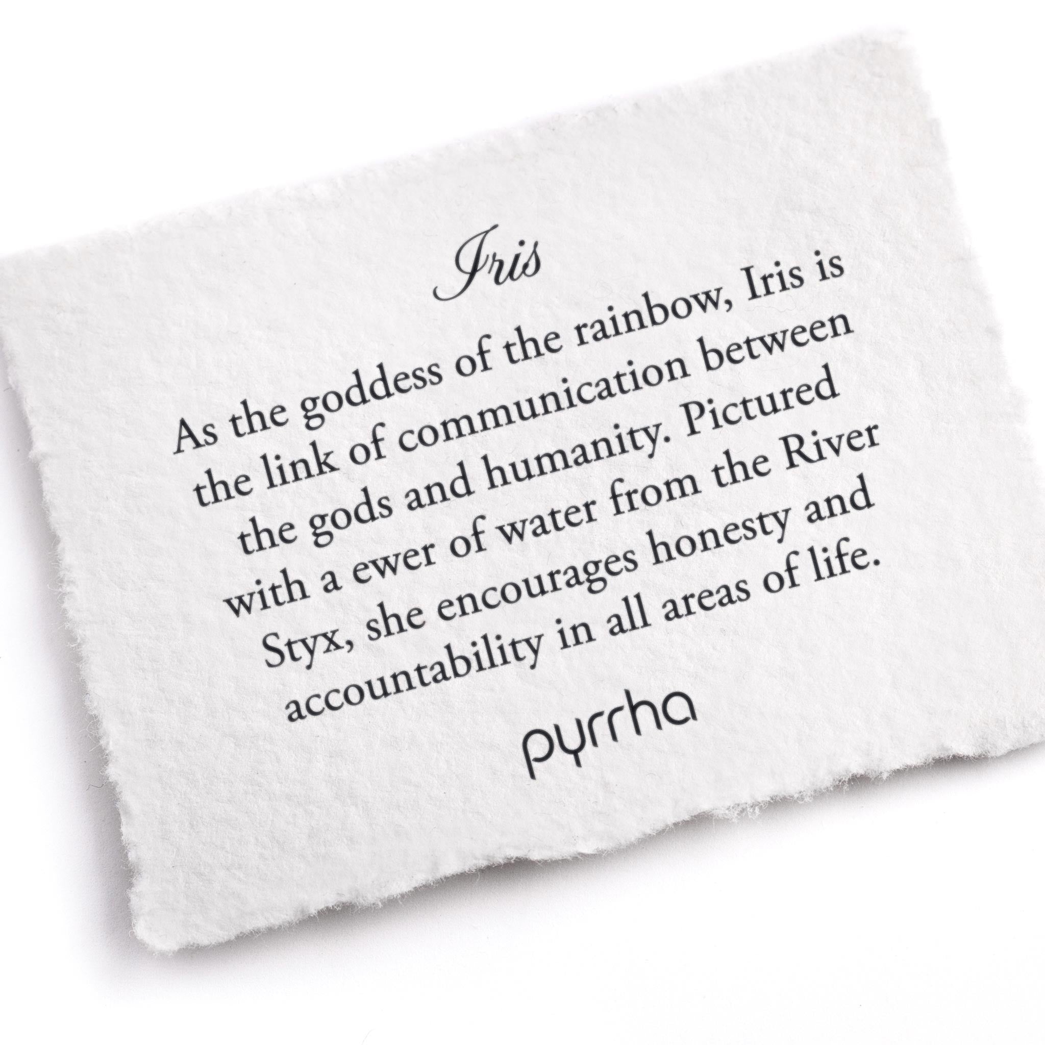 A hand-torn, letterpress printed card describing the meaning for Pyrrha's Iris Goddess Talisman