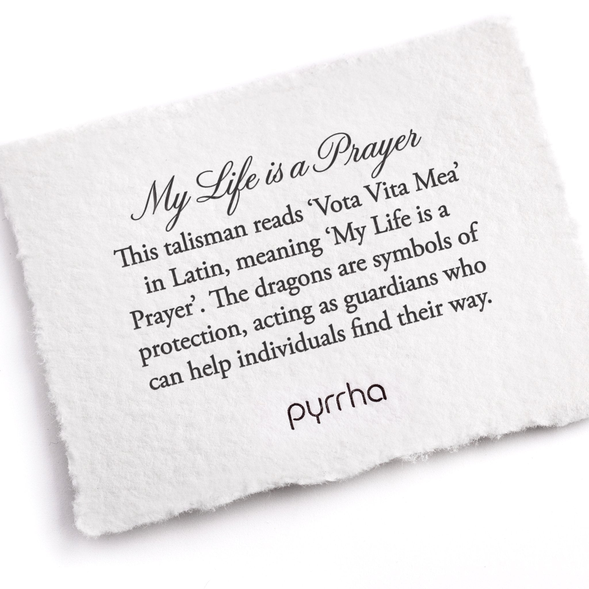 A hand-torn, letterpress printed card describing the meaning for Pyrrha's My Life is a Prayer Talisman