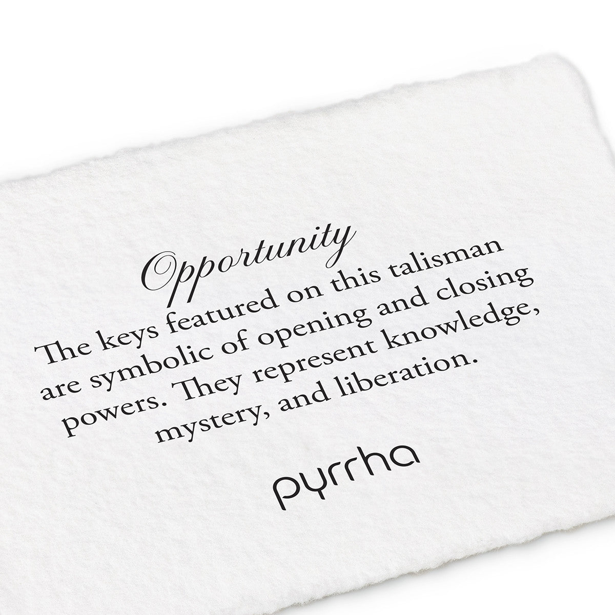 A hand-torn, letterpress printed card describing the meaning for Pyrrha's Opportunity Talisman
