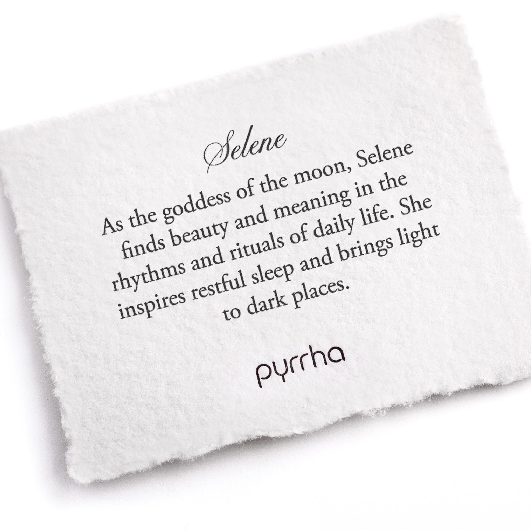 A hand-torn, letterpress printed card describing the meaning for Pyrrha's Selene Goddess Talisman