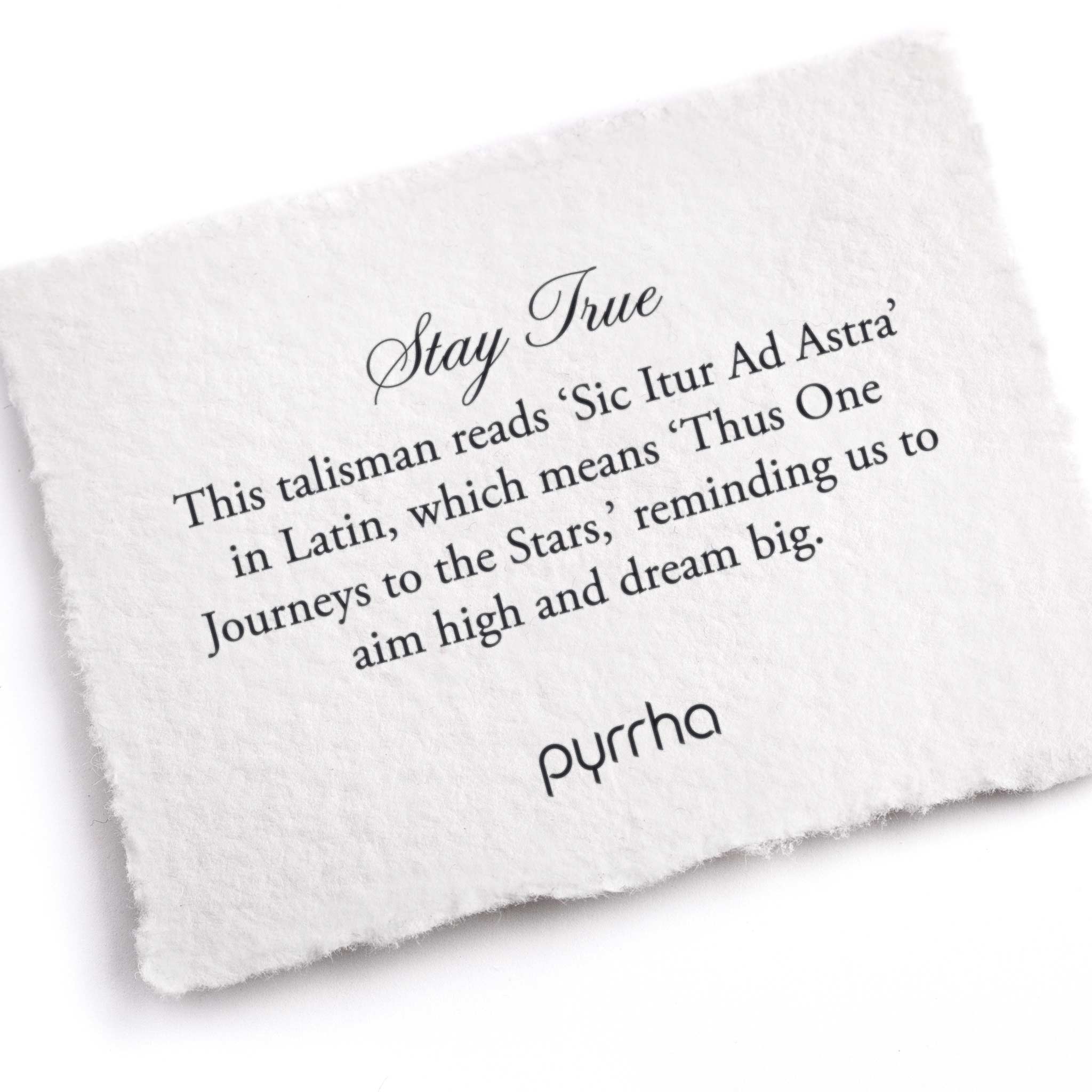 A hand-torn, letterpress printed card describing the meaning for Pyrrha's Stay True Talisman