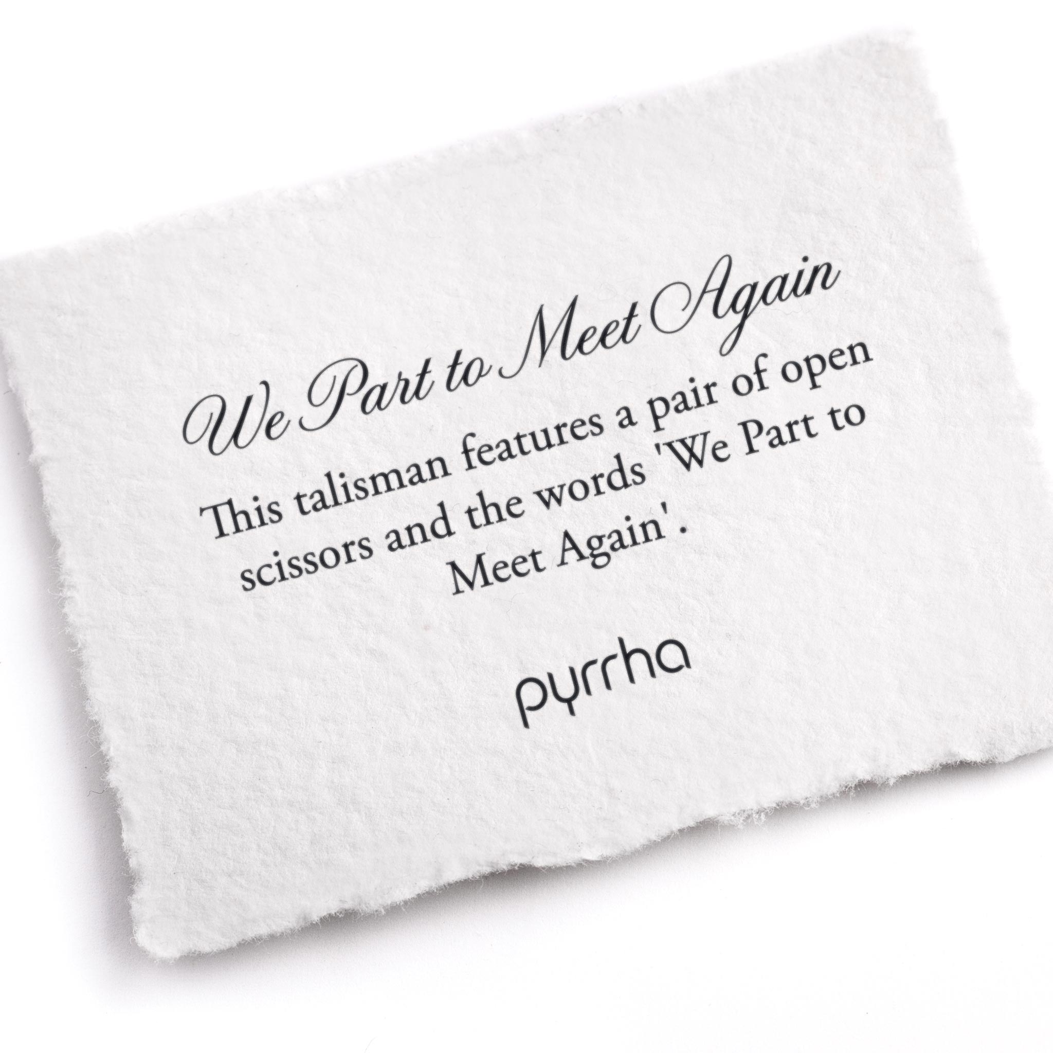 A hand-torn, letterpress printed card describing the meaning for Pyrrha's We Part to Meet Again Locket