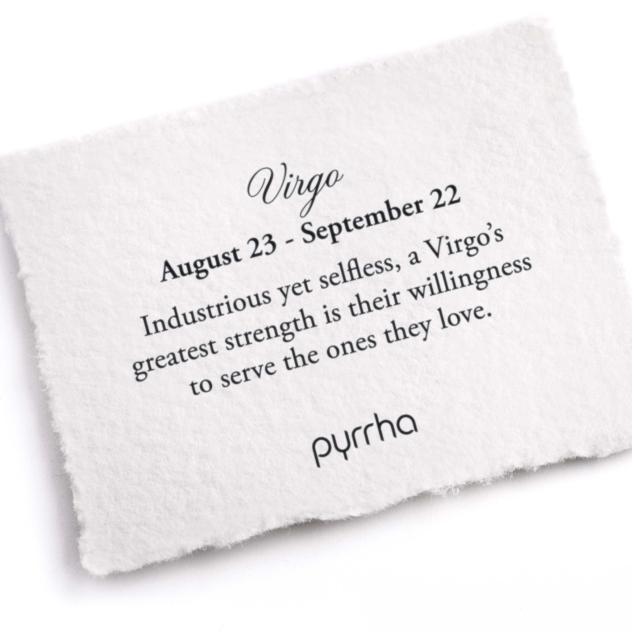 A hand-torn, letterpress printed card describing the meaning for Pyrrha's Virgo Zodiac Talisman